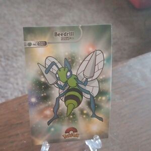 Pokemon Trading Card with Green and Black Design